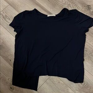 Niyama Sol navy blue top. Size medium. Lightweight and open in back